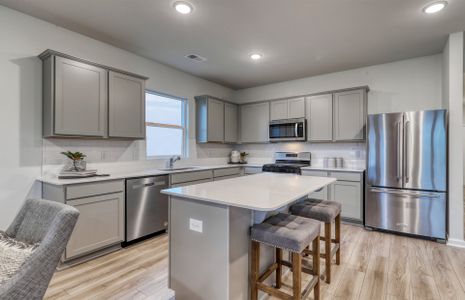 Beautiful Open Kitchen with an island and stainles