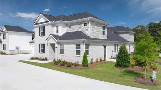 New construction Townhouse house 575 Silver Moon Dr, Loganville, GA 30052 - photo 0