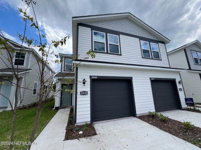 New construction Townhouse house 10648 Waterfield Road, Unit 84, Jacksonville, FL 32210 - photo 0