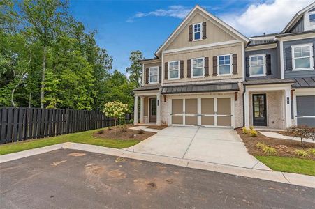 New construction Townhouse house 206 Grady Burrell Dr, Holly Springs, GA 30115 - photo 0