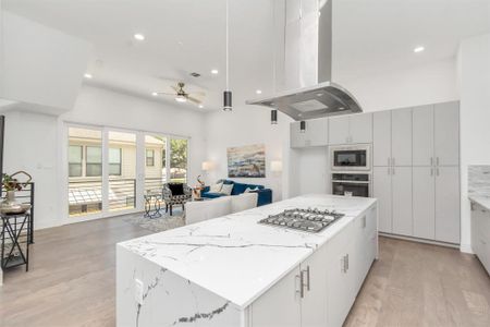 Expansive Kitchen Island Complete with a Built-In Microwave