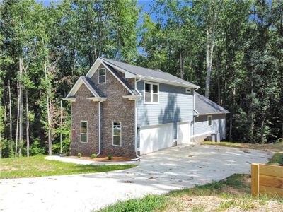 New construction Single-Family house 1119 Plantation Dr Se, Conyers, GA 30094 - image