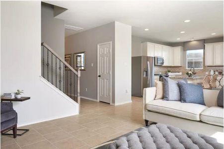 Photo of Pulte model home with same floor plan, not of actual home listed.