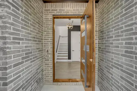 Corridor with brick wall