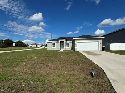 New construction Single-Family house 129 Lily Lane, Kissimmee, FL 34759 - photo 0