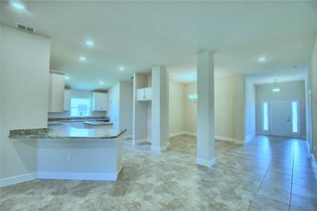 Photos are from a completed floor plan. Colors/finishes may vary.