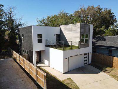 Modern home featuring a garage