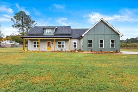 New construction Single-Family house 1203 Temple Johnson Road, Loganville, GA 30052 - photo 0