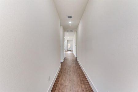 Hallway featuring hardwood / wood-style flooring