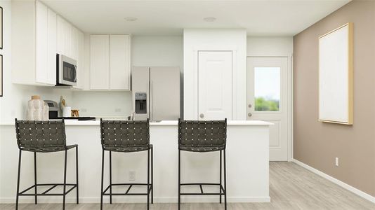 Kitchen featuring light wood-type flooring, refrigerator with ice dispenser, white cabinets, and a breakfast bar