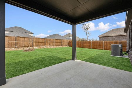 The covered patio is just right for a casual cookout with friends.