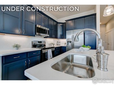 New construction Townhouse house 4128 Trapper Lake Dr, Loveland, CO 80538 - photo 0