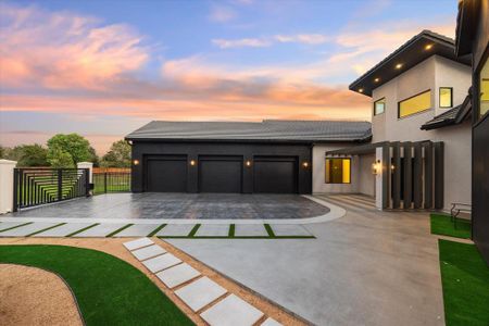 As you drive up your driveway, you're greeted by a sense of elegance and security. The 3-car garage, equipped with automatic door openers and security cameras, ensures peace of mind and convenience.