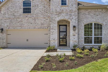 Property entrance featuring a garage