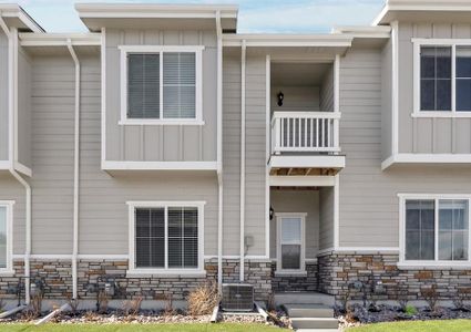 New construction Townhouse house 135 Robin Road, Johnstown, CO 80534 - photo 0