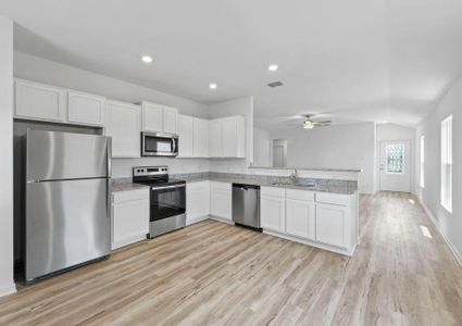 The kitchen has a breakfast bar