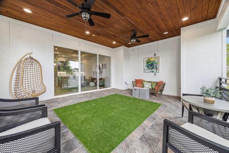 Another view of the covered third floor balcony with two ceiling fans (Similar floor plan)