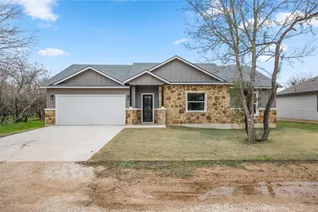 New construction Single-Family house 123 Waimanalo Dr, Bastrop, TX 78602 - photo 0