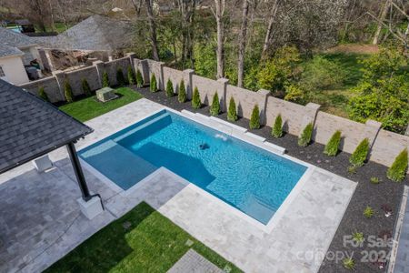 Pool with waterfall feature