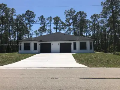 New construction Duplex house 1112 E 12, Lehigh Acres, FL 33972 - image