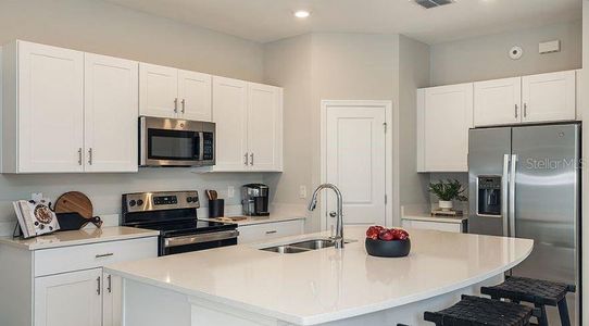 New construction Townhouse house 2569 Penguin Blvd, Davenport, FL 33837 Marigold- photo 3 3