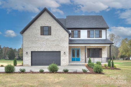 New construction Single-Family house 13900 Idlewild Road, Matthews, NC 28105 - photo 0