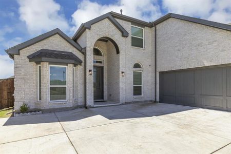 French country style house featuring a garage