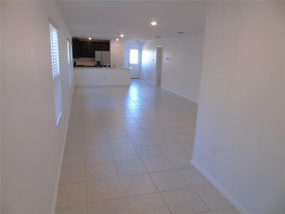 Spare room featuring light tile patterned floors