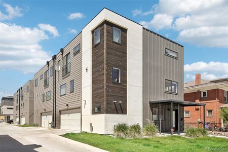 Both duplexes from the garage/south side