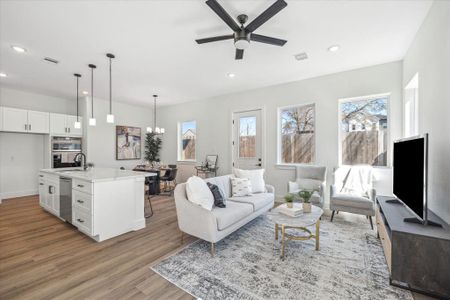 Open concept living at it's finest, with living, dining, kitchen, garage access and a half bath, all located on the first level of this home.  Window treatments (not shown) have been installed as an added bonus!