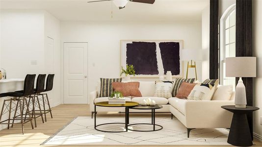 Living room with ceiling fan and light hardwood / wood-style floors