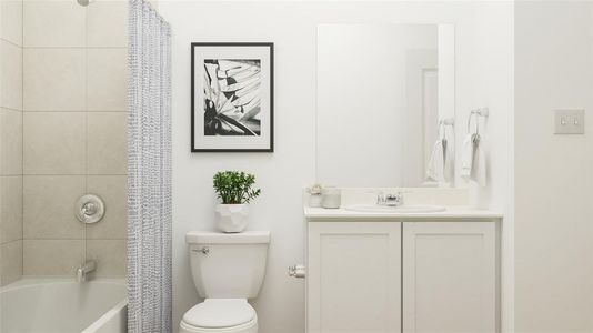 Full bathroom featuring shower / bath combo, toilet, and vanity