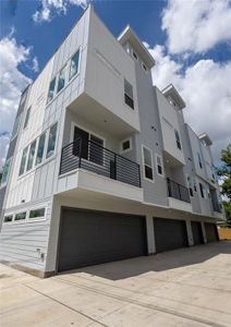 View of property with a garage