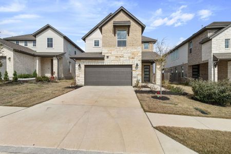 Home featuring garage, and long driveway