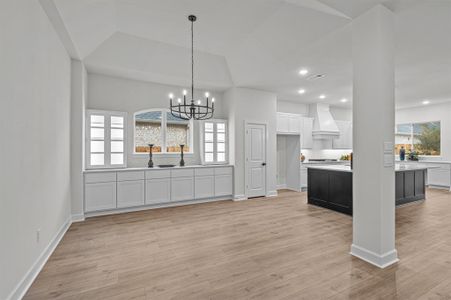 EXAMPLE PHOTO: Beautiful Dining room with room for a table that seats 8 people! Coiffered ceiling too!