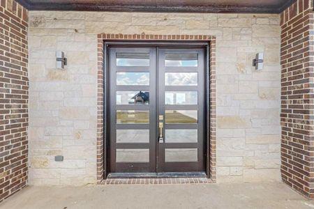 Doorway to property featuring french doors