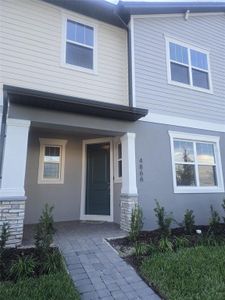 New construction Townhouse house 4866 Prairie Preserve Run, Saint Cloud, FL 34772 - photo 0