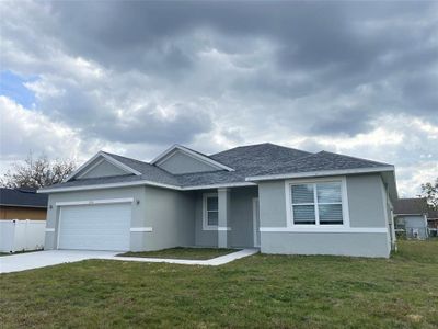 New construction Single-Family house 616 Parakeet Court, Poinciana, FL 34759 - photo 0