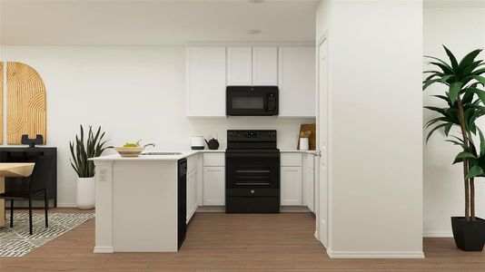 Kitchen featuring light hardwood / wood-style floors, white cabinets, kitchen peninsula, black appliances, and sink