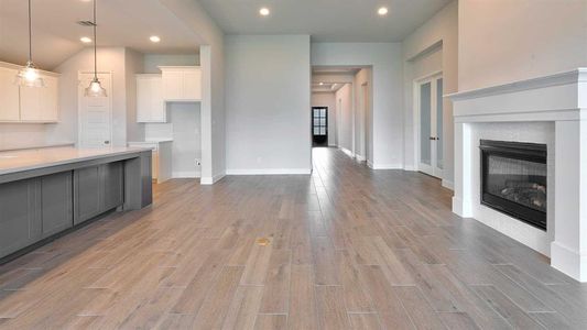 Unfurnished living room with light hardwood / wood-style flooring