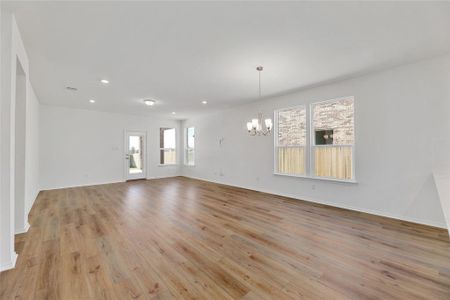 Bright and airy living space with large windows, perfect for relaxation.