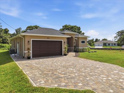 New construction Single-Family house 810 Sentinela Blvd, Lehigh Acres, FL 33974 - image