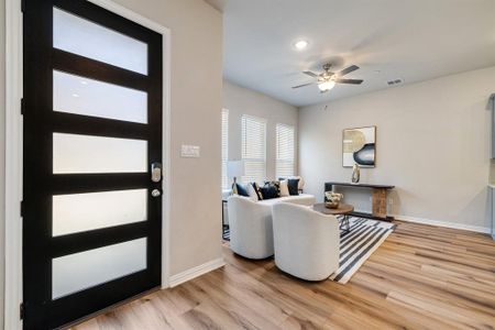 Entryway featuring light hardwood / wood-style flooring and ceiling fan