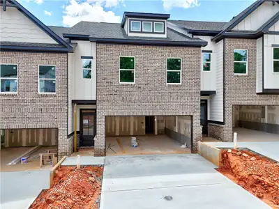 New construction Townhouse house 5722 Urban Village Wy, Unit 8, Tucker, GA 30084 Sweetwater- photo 0