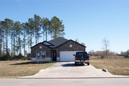 New construction Single-Family house 633 Rd 5117, Cleveland, TX 77327 - photo 0