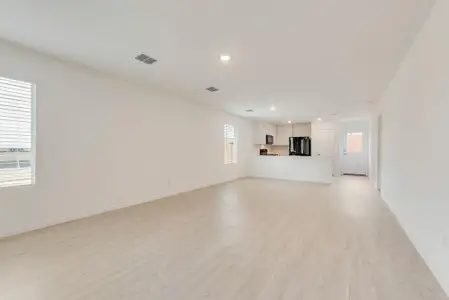 Unfurnished living room featuring light hardwood / wood-style floors