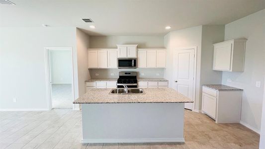 Kitchen - All Home and community information, including pricing, included features, terms, availability and amenities, are subject to change at any time without notice or obligation. All Drawings, pictures, photographs, video, square footages, floor plans, elevations, features, colors and sizes are approximate for illustration purposes only and will vary from the homes as built.