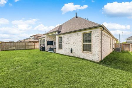 Step into a private backyard oasis with ample green space and a covered patio, ideal for outdoor gatherings or quiet relaxation. Step into a private backyard oasis with ample green space and a covered patio, ideal for outdoor gatherings or quiet relaxation.