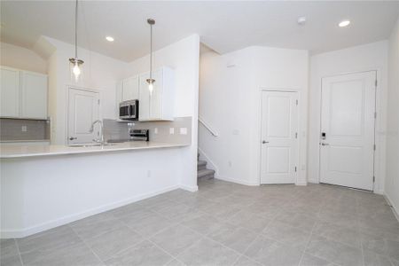 New construction Townhouse house 10580 Ebb Tide Ln, Orlando, FL 32821 - image 9