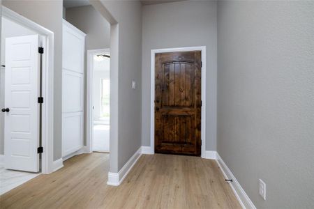 Entryway featuring luxury vinyl plank flooring